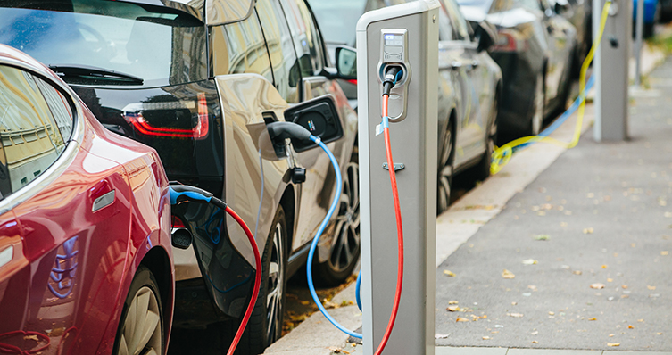 electric vehicles in a row recharge.